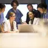 People in front of a computer