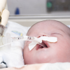 Baby with feeding tube